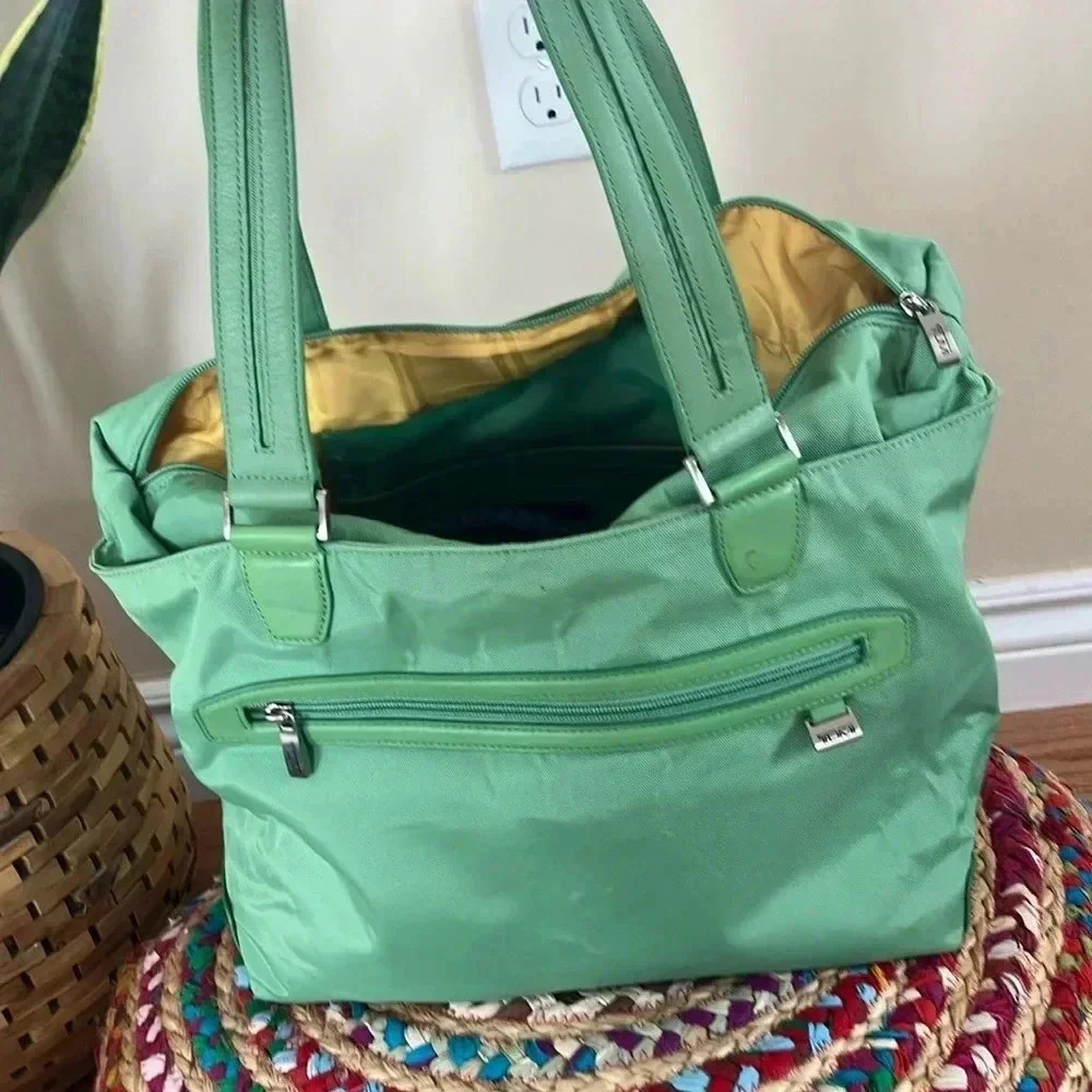 Tumi  green nylon leather trim shoulder bag